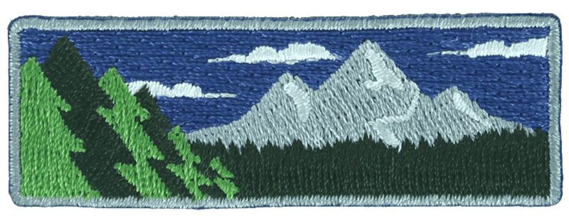Trail Life USA Woodlands Timberline Award patch depicting mountain landscape
